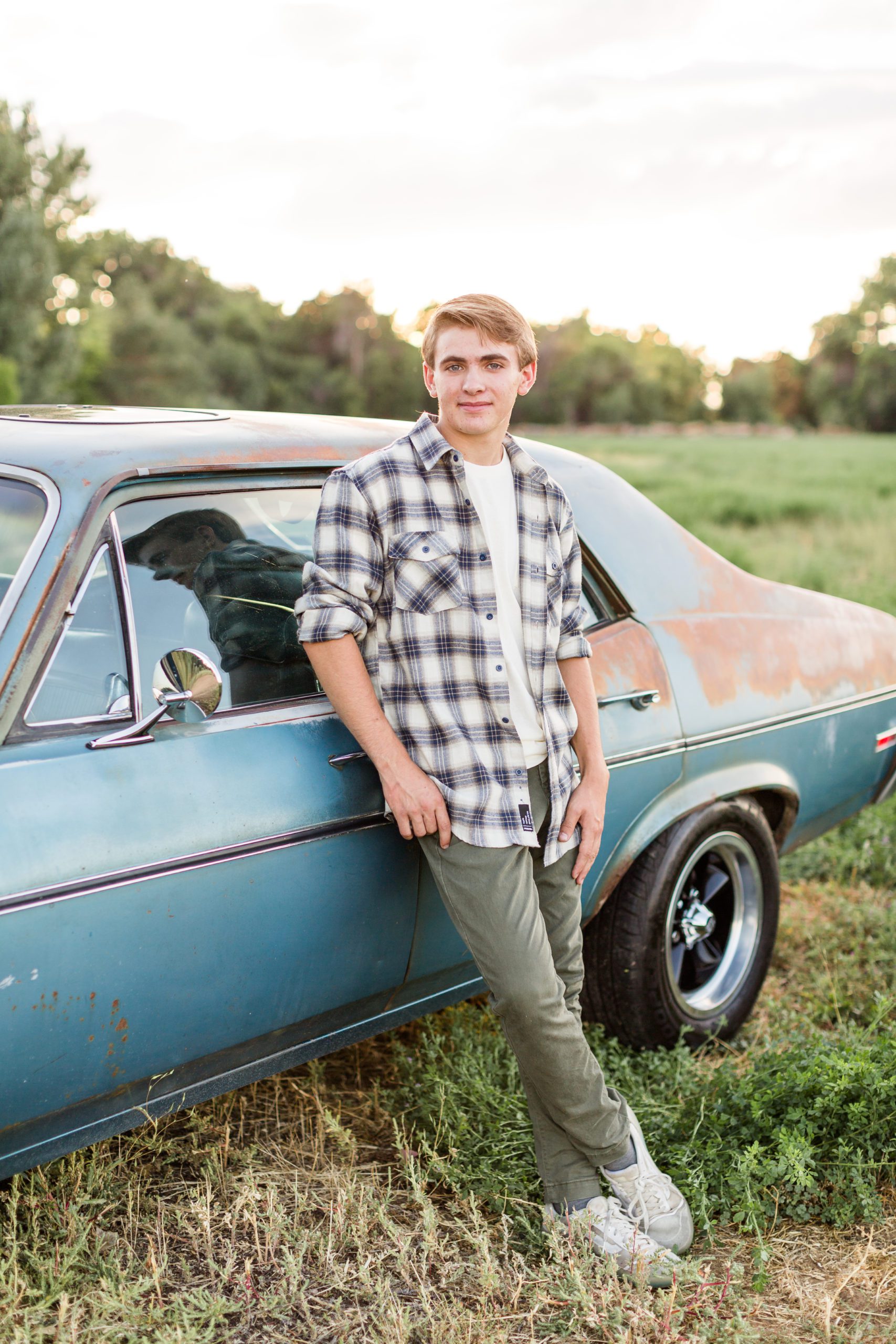 Guy's senior pictures with cars