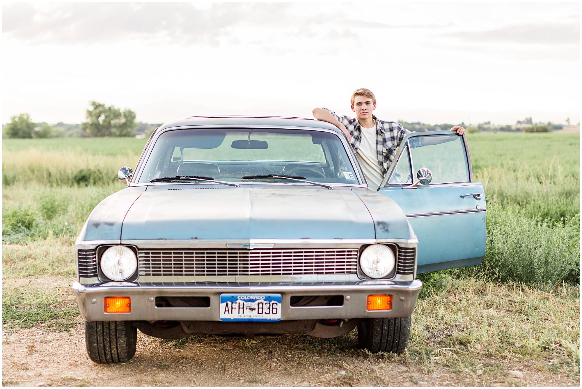 Guy's senior pictures with cars