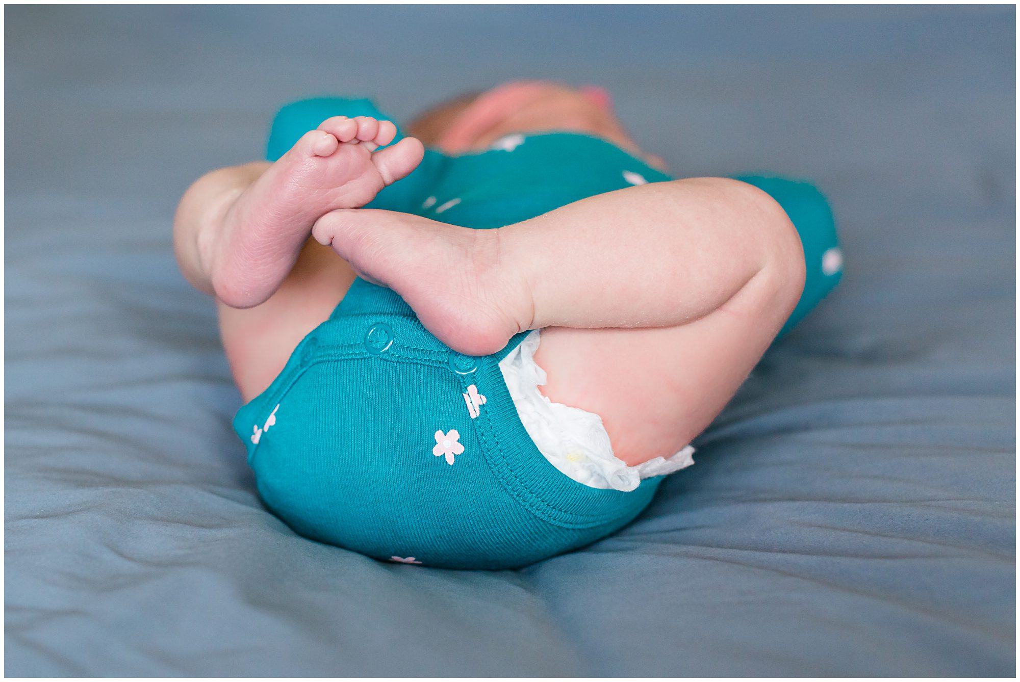 A closeup of a sleeping newborn's feet