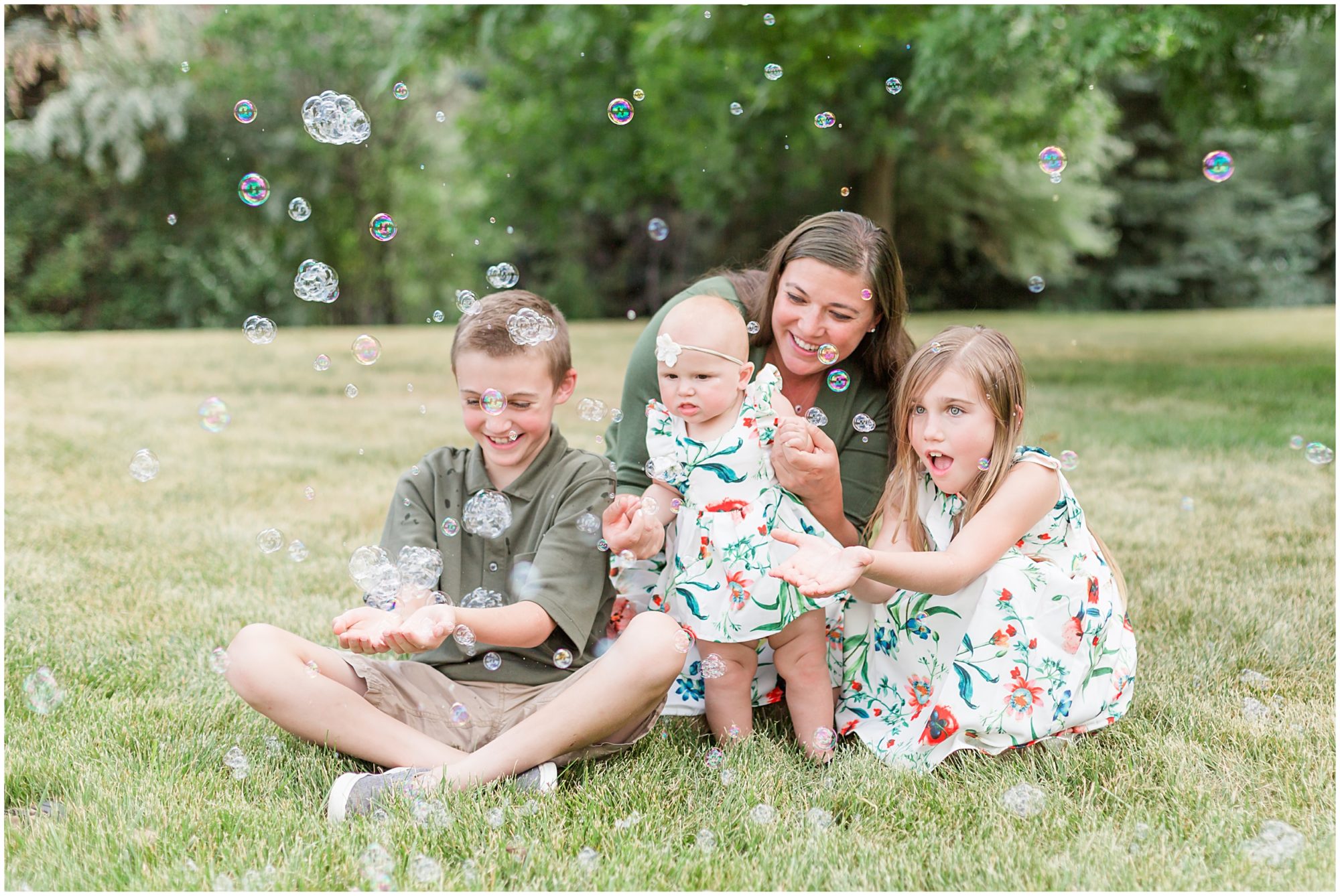 Summer photo sessions tips using bubbles during a family photo session in Erie Colorado