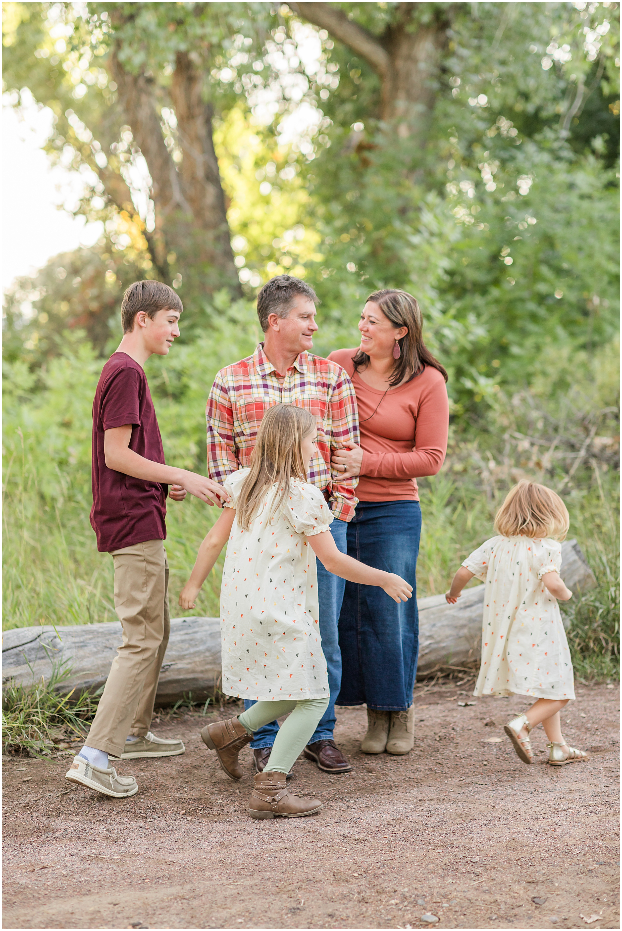 Family of five at McKay Lake, taken by Erie family photographer Theresa Pelser during their mini family session