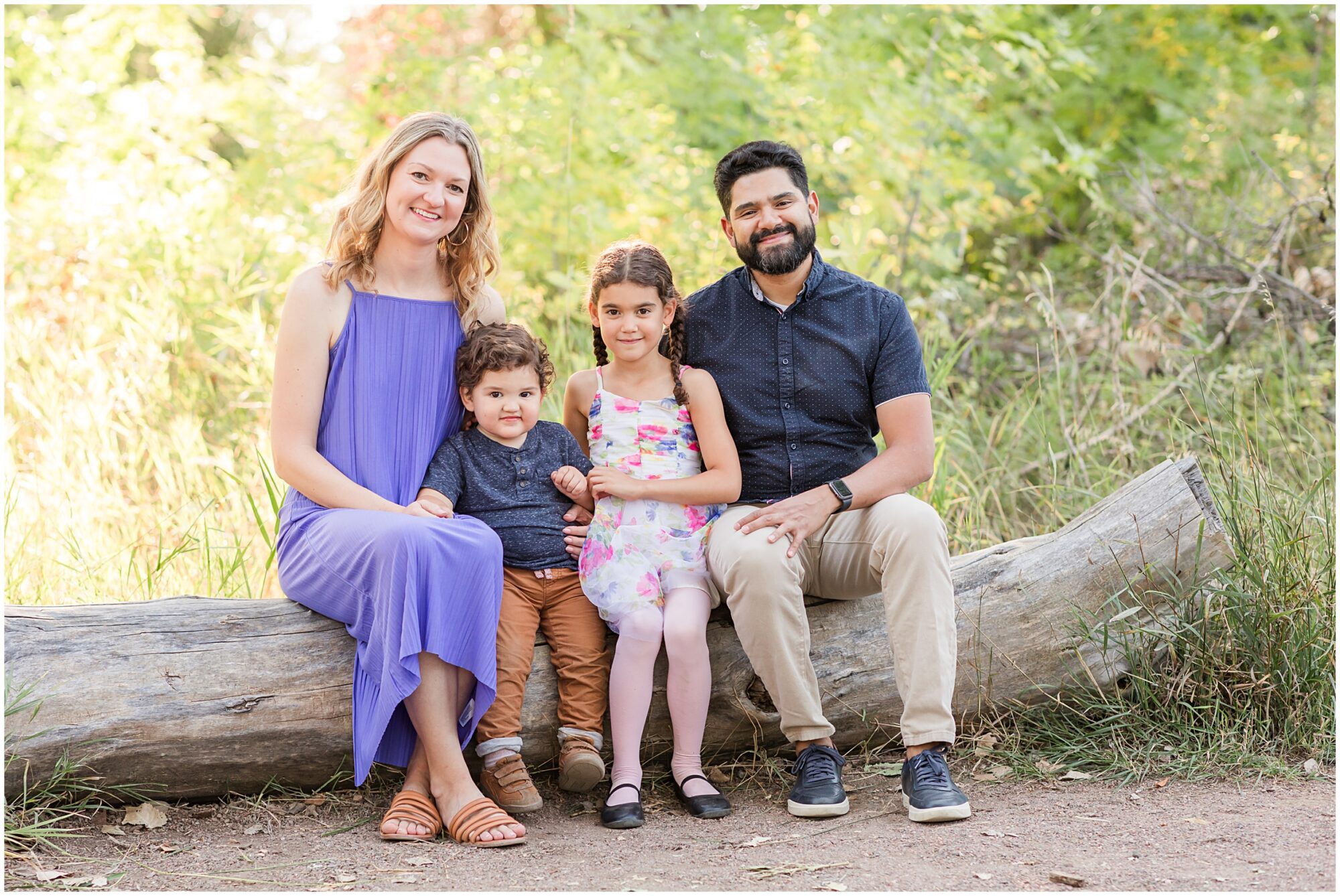 Family of four at McKay Lake, taken by Erie family photographer Theresa Pelser during their mini family session