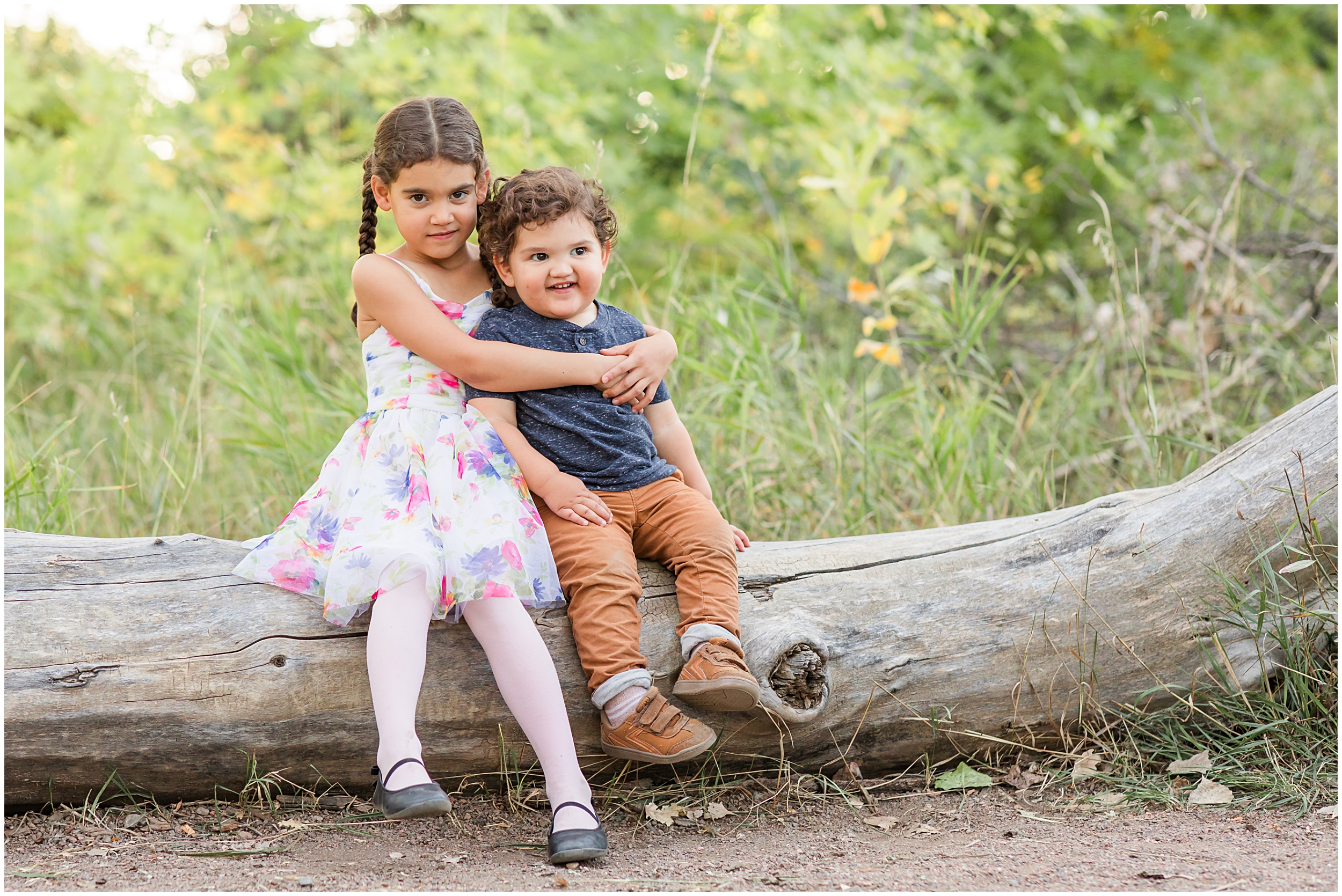 Sibling love during a mini family session at McKay Lake with Theresa Pelser Photography, your Erie family photographer