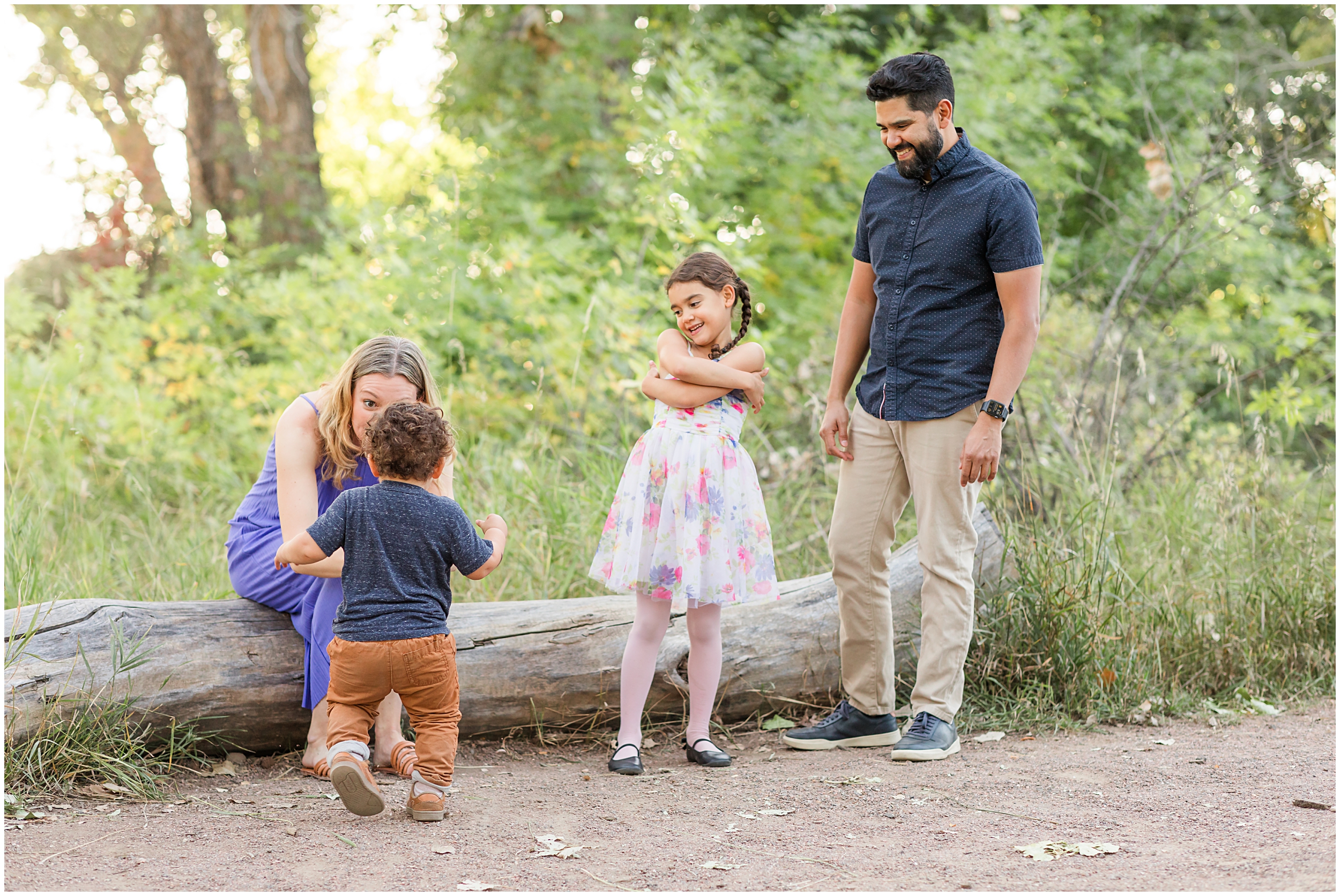Family of four at McKay Lake, taken by Erie family photographer Theresa Pelser during their mini family session